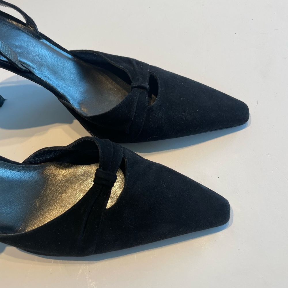 Stuart Weitzman black suade dress shoes.